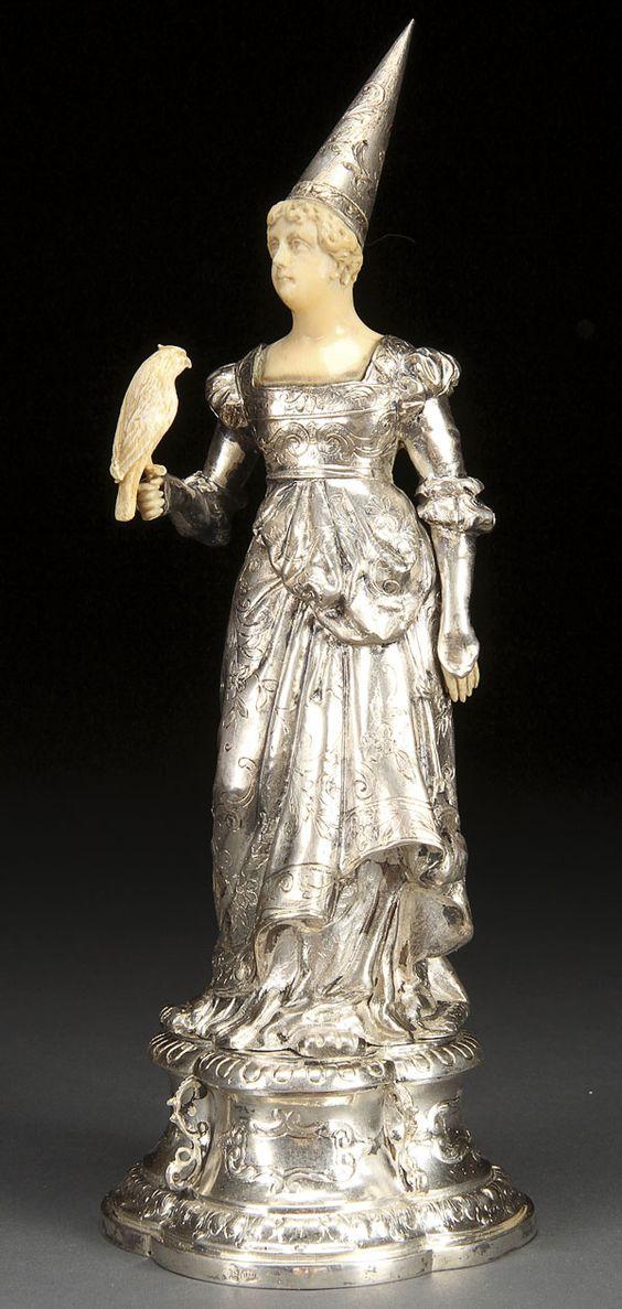 A Continental Silver and Carved Ivory Medieval Maiden, circa 1900.